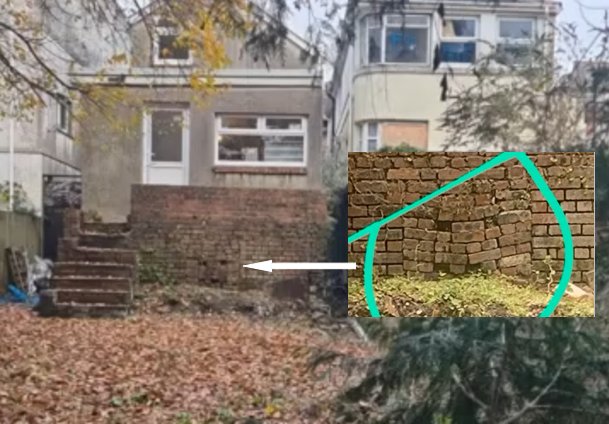 Rear wall with loose bricks